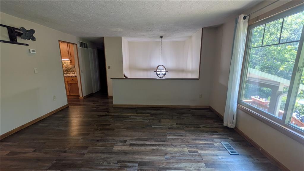 201 Colleen Street Butler, PA 16001 - Photo 18 of 33 a view of a room with wooden floor and window