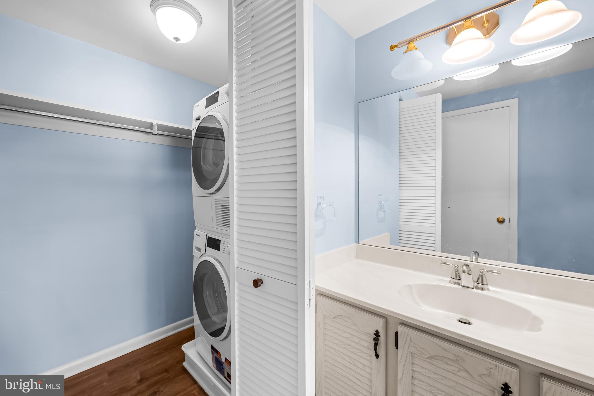 4 Cross Keys Road, Unit 4E Baltimore, MD 21210 - Photo 9 of 17 primary bath w/miele washer/dryer