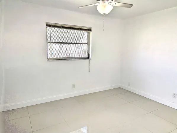 a view of a bathroom with a glass door