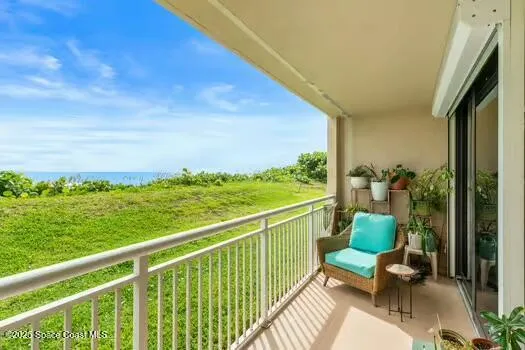a view of a two chair in the balcony