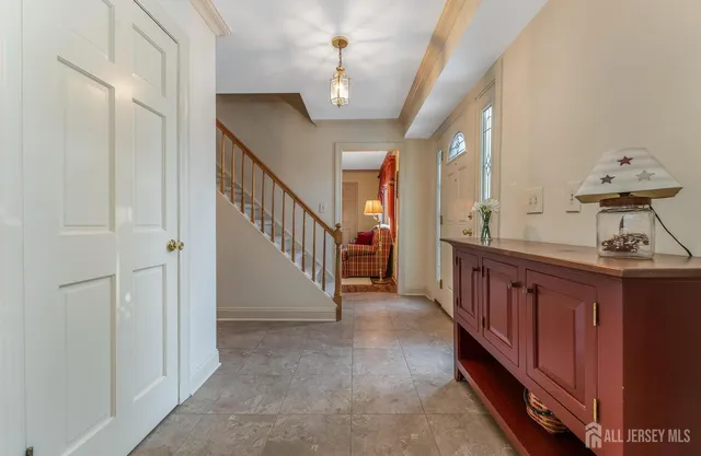 a bathroom with a sink a toilet and a shower