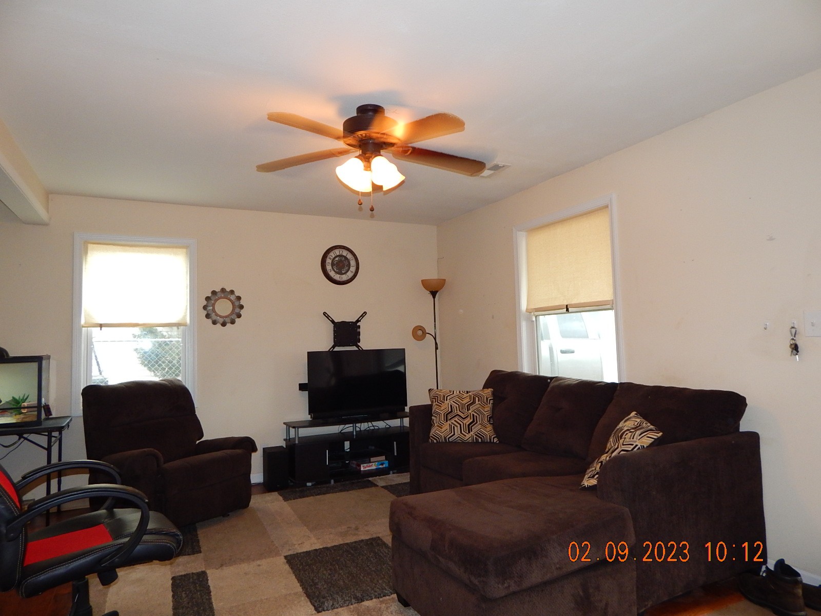 238 Burch Road Clarksville, TN 37042 - Photo 3 of 23 a living room with furniture a flat screen tv and a window