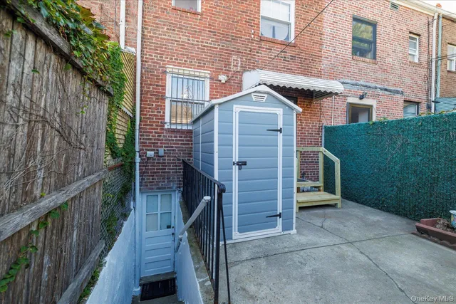 a front view of a house with parking area