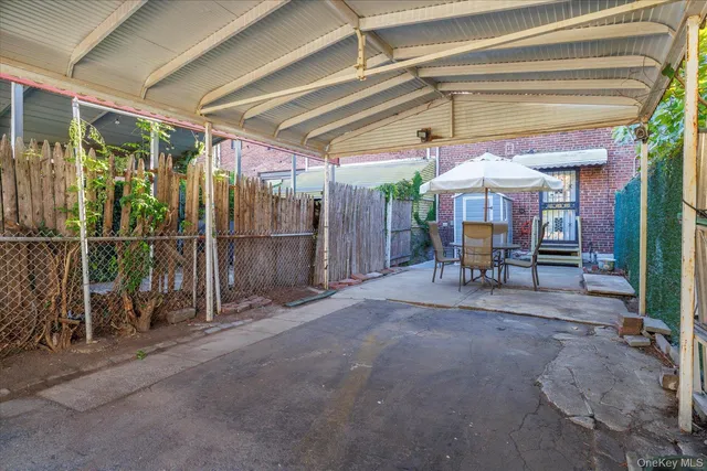 a view of room with wooden floor