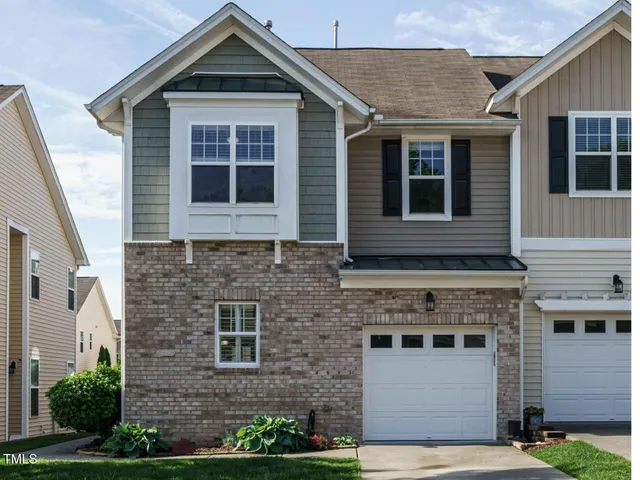 a front view of a house with windows