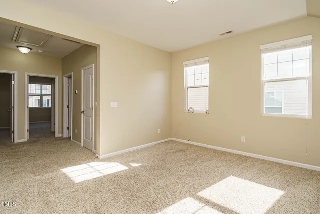 an empty room with windows