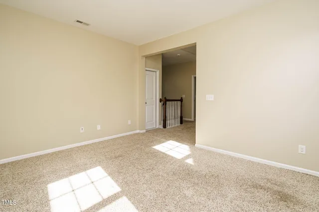 a view of an empty room with window