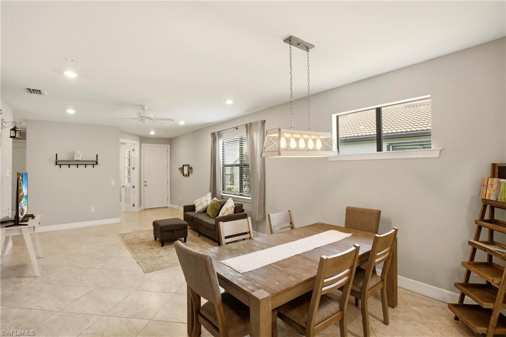 11216 Carlingford Road Fort Myers, FL 33913 - Photo 17 of 38 a view of a dining room with furniture