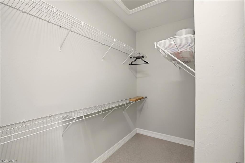 11216 Carlingford Road Fort Myers, FL 33913 - Photo 21 of 38 a view of a room with racks on the wall