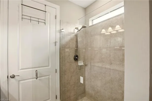 a bathroom with a double vanity sink mirror and double
