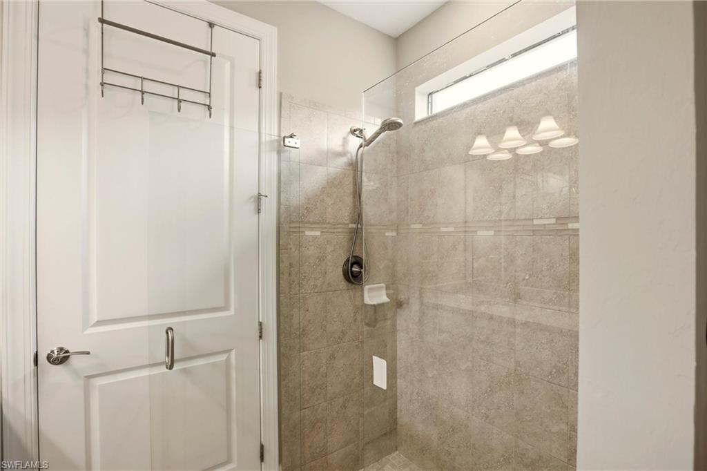 11216 Carlingford Road Fort Myers, FL 33913 - Photo 23 of 38 a bathroom with a shower