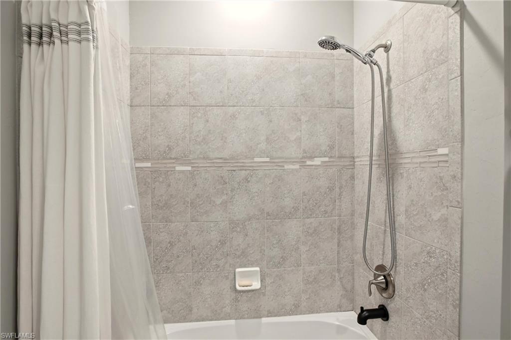 11216 Carlingford Road Fort Myers, FL 33913 - Photo 28 of 38 a bathroom with a shower