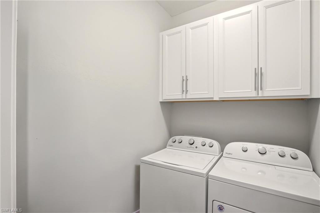 11216 Carlingford Road Fort Myers, FL 33913 - Photo 29 of 38 a utility room with dryer and washer