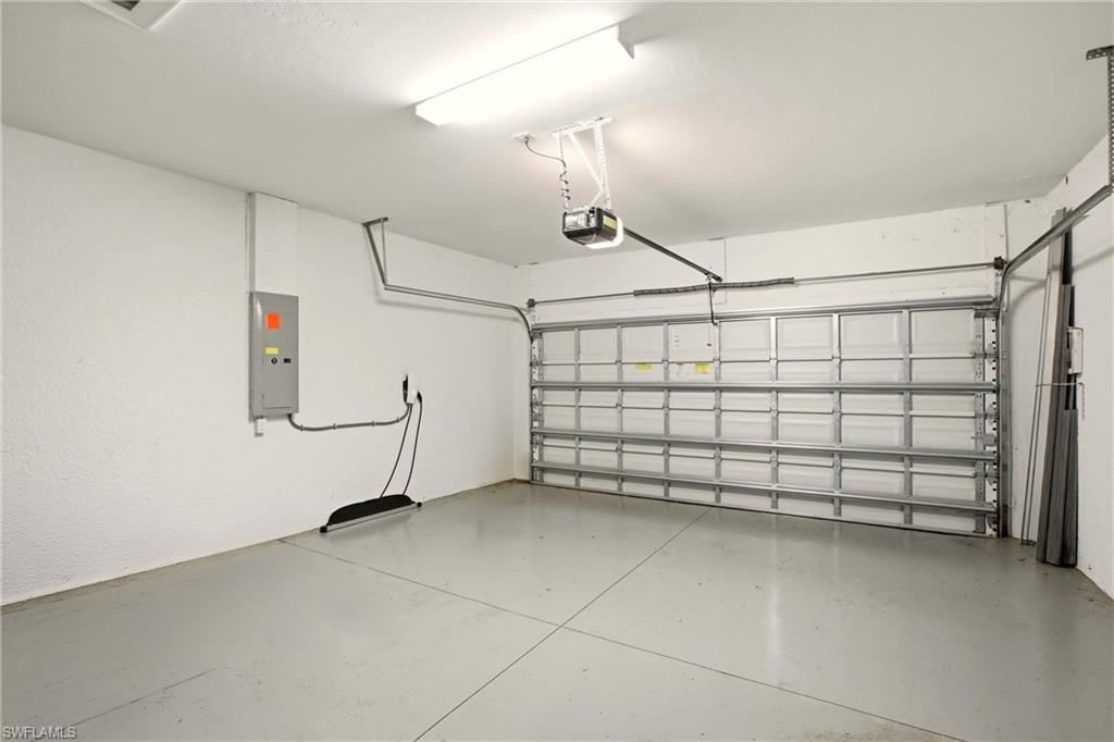 11216 Carlingford Road Fort Myers, FL 33913 - Photo 30 of 38 a view of a garage