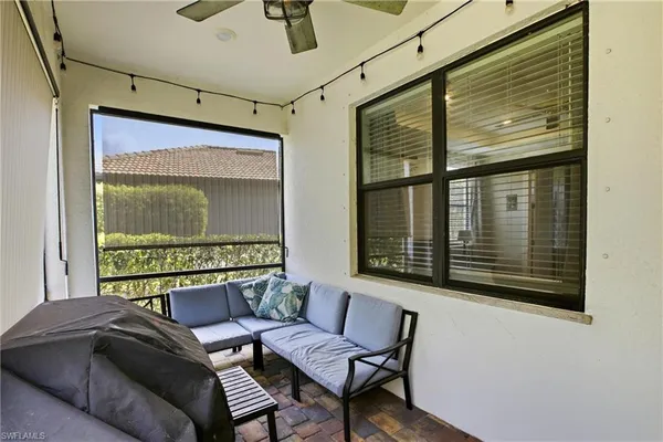 a front view of house with a garden