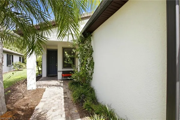 a front view of a house with a porch