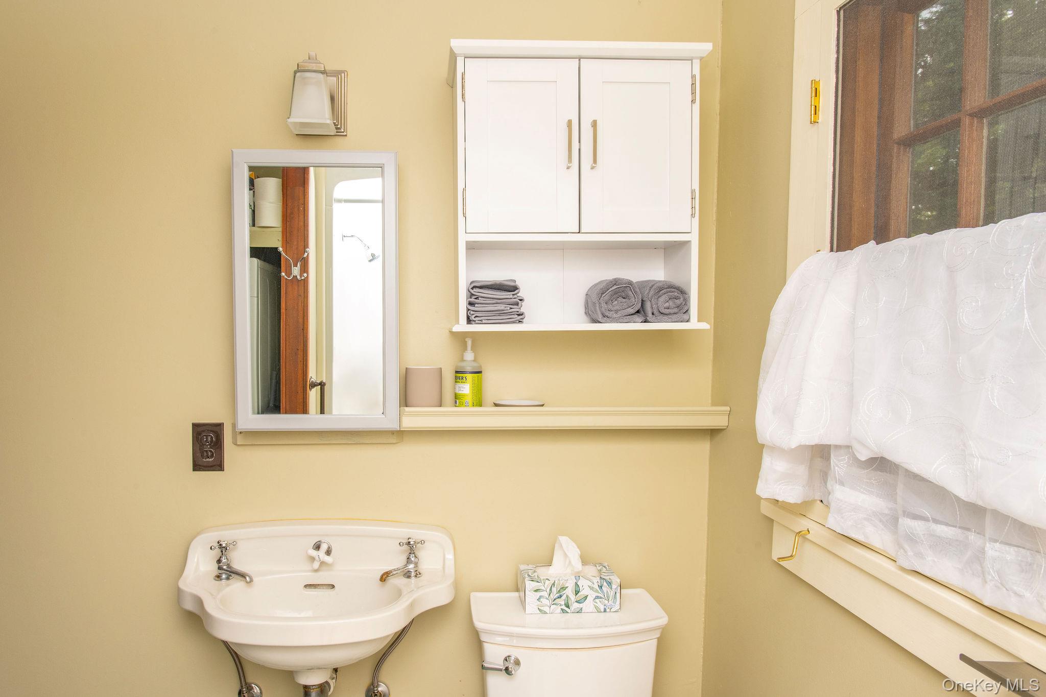 11 Locust Drive Cold Spring, NY 10516 - Photo 14 of 23 Full bathroom with shower, in-unit washer and dryer, and convenient everyday functionality.