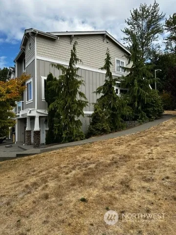 a house with trees in front of it
