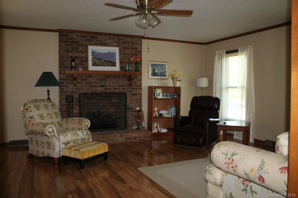 3147 Horseshoe Trail Fort Mill, SC 29708 - Photo 2 of 12 a living room with furniture and a fireplace