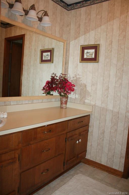 3147 Horseshoe Trail Fort Mill, SC 29708 - Photo 7 of 12 a bathroom with a sink mirror and vanity