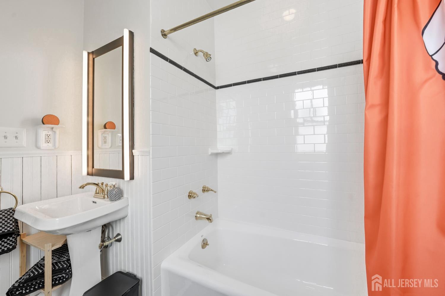 346 East Union Street Burlington, NJ 08016 - Photo 23 of 48 a bathroom with a sink and a mirror