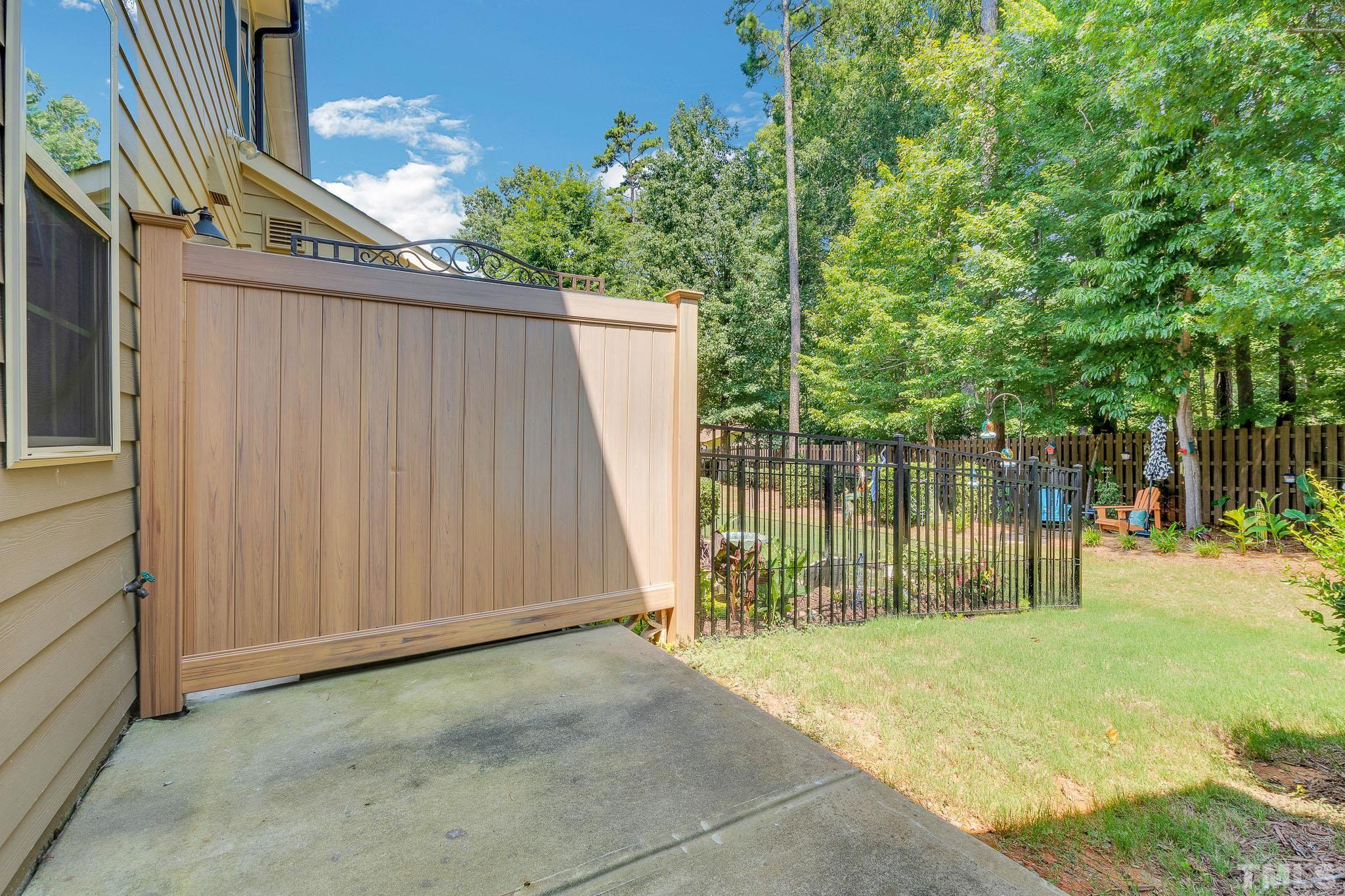 762 Wickham Ridge Road Apex, NC 27539 - Photo 28 of 32 a backyard of a house