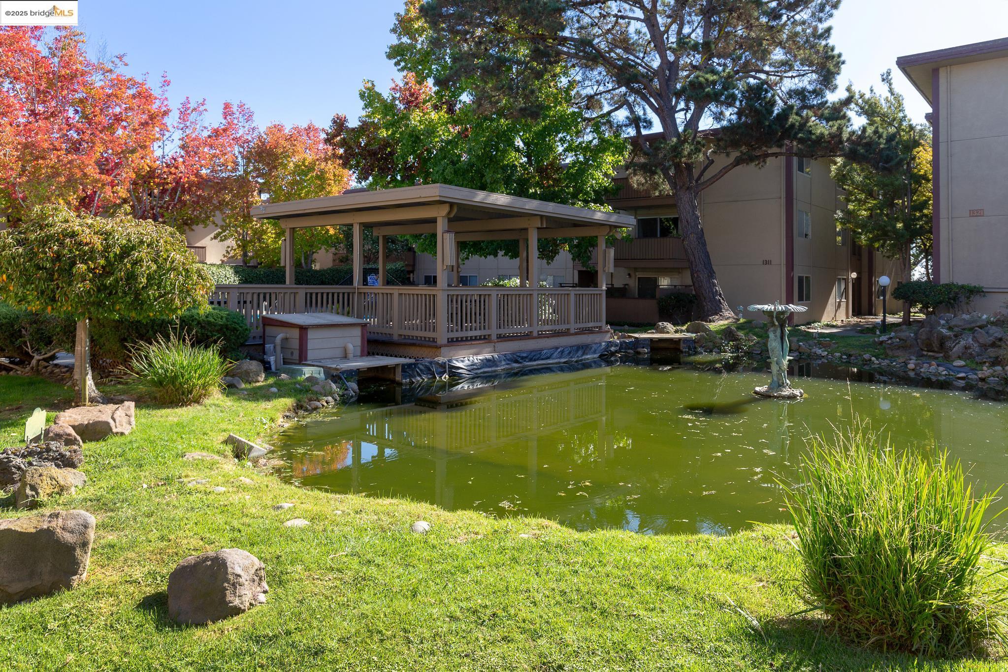 1311 Webster Street, Unit E316 Alameda, CA 94501 - Photo 30 of 39 a house with swimming pool