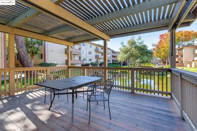 a view of a chairs on the roof deck