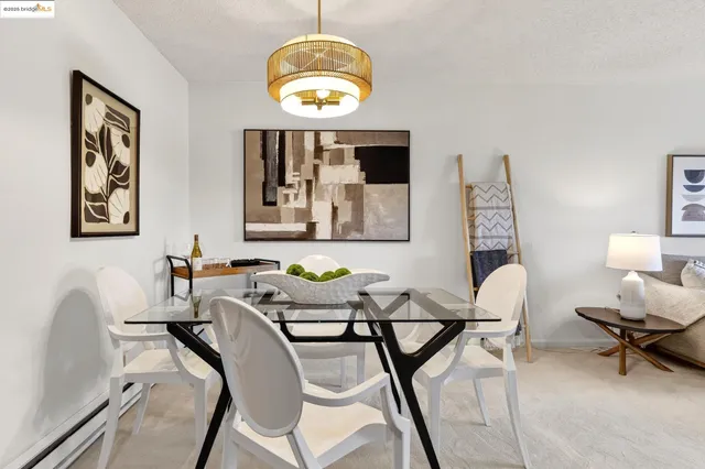 a view of a dining room with furniture