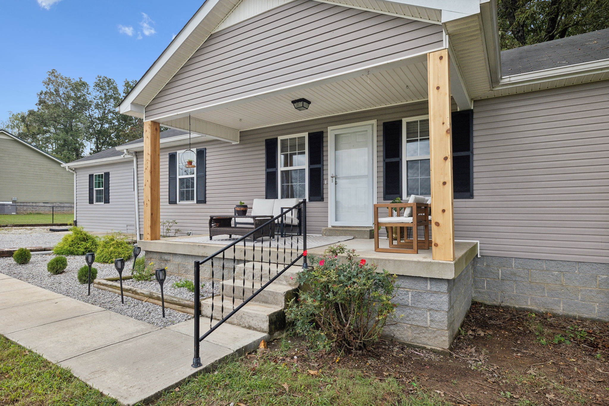 261 Tom Johnson Road Morrison, TN 37357 - Photo 1 of 40 a view of a house with backyard and sitting area