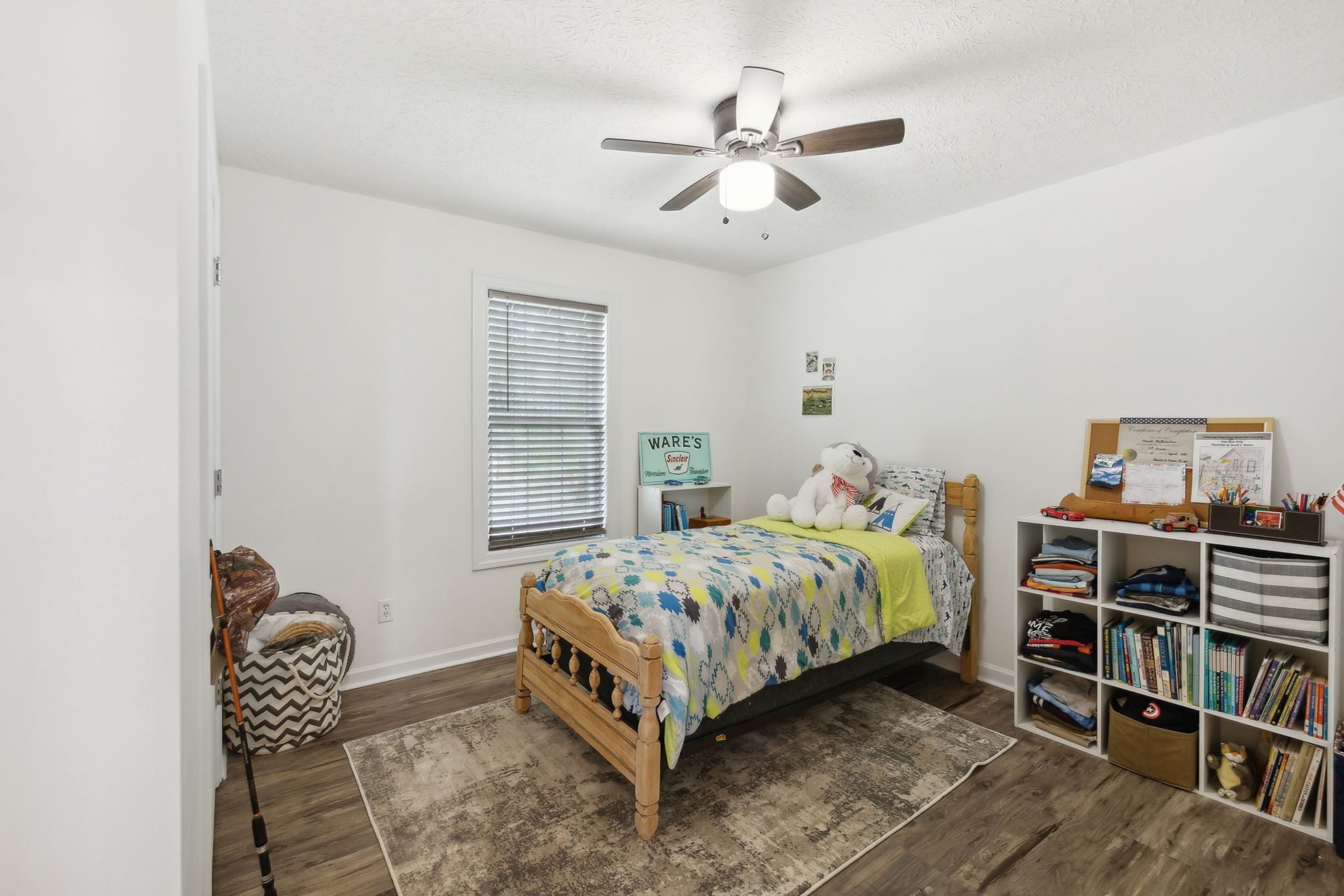 261 Tom Johnson Road Morrison, TN 37357 - Photo 15 of 40 a bedroom with a bed furniture and book shelf