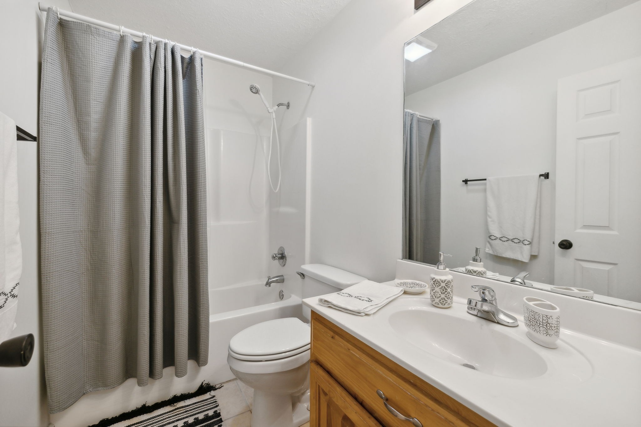 261 Tom Johnson Road Morrison, TN 37357 - Photo 16 of 40 a bathroom with a sink toilet and shower a mirror