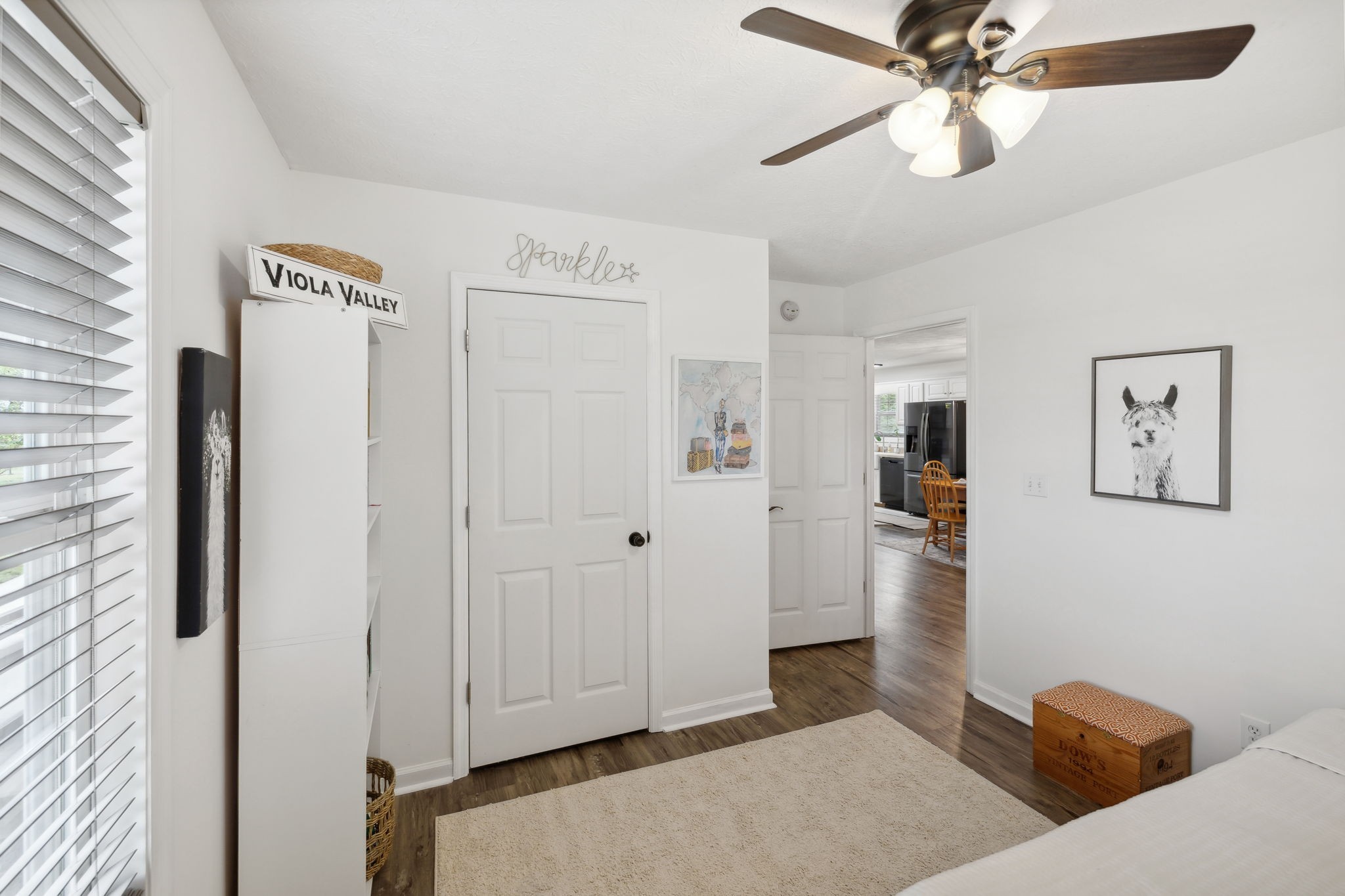 261 Tom Johnson Road Morrison, TN 37357 - Photo 18 of 40 a bedroom with a bed and a chandelier