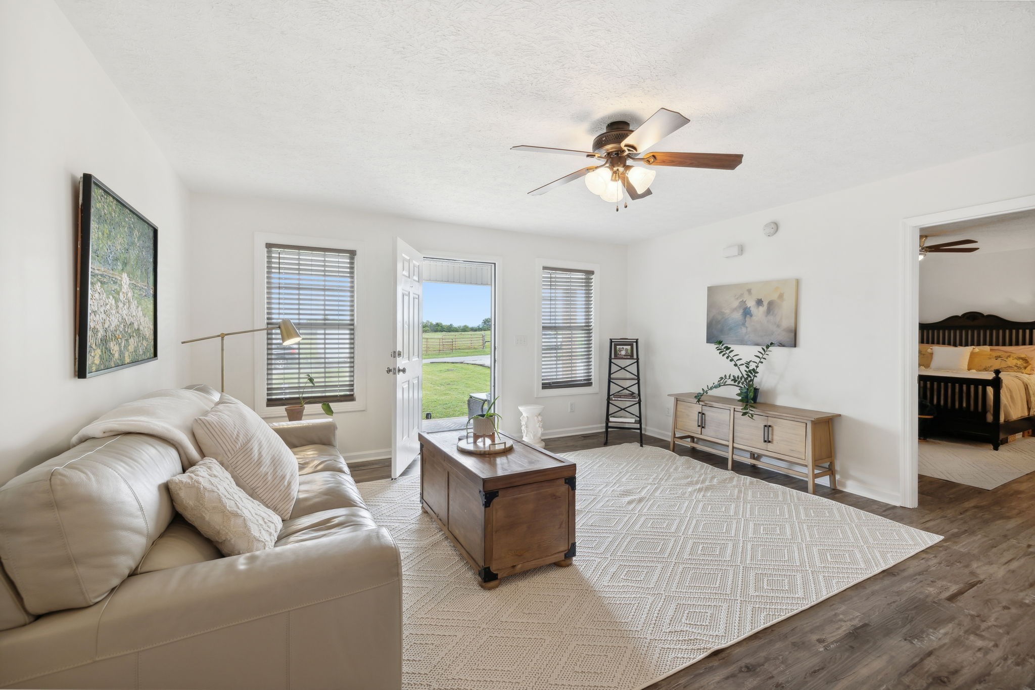 261 Tom Johnson Road Morrison, TN 37357 - Photo 2 of 40 a living room with furniture and a flat screen tv