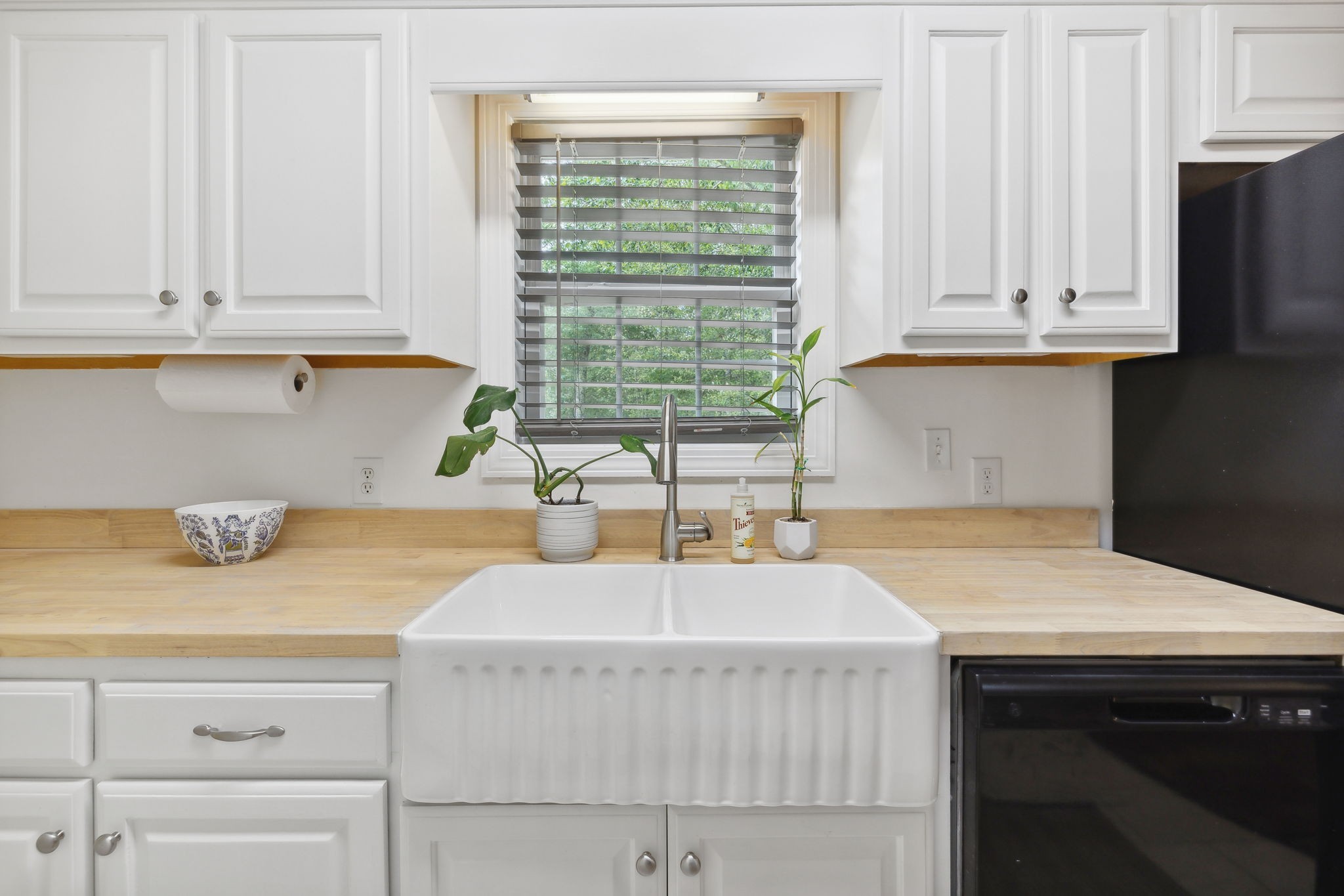 261 Tom Johnson Road Morrison, TN 37357 - Photo 23 of 40 a kitchen with a sink and cabinets