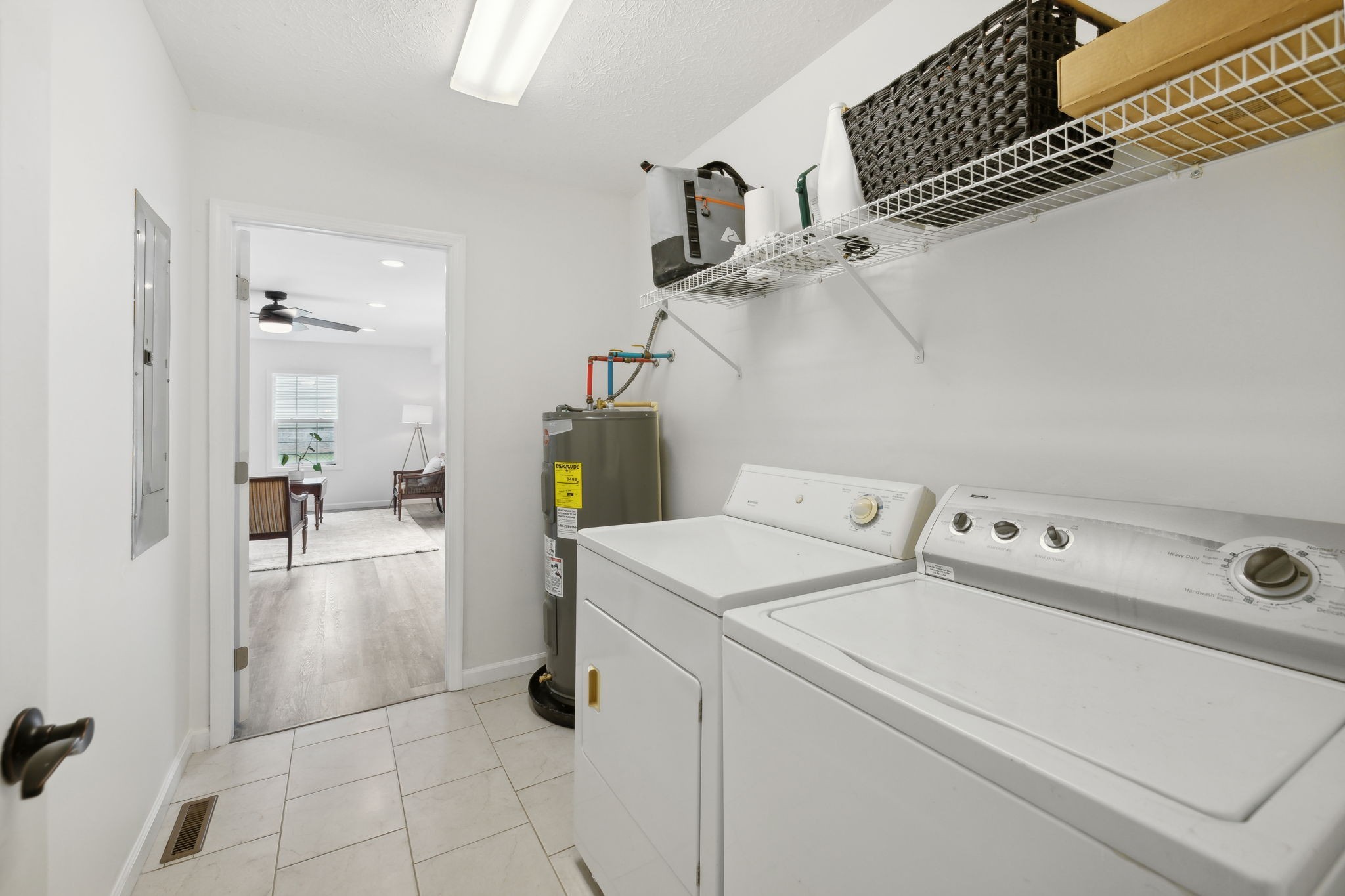 261 Tom Johnson Road Morrison, TN 37357 - Photo 24 of 40 a view of storage and utility room with washer and dryer