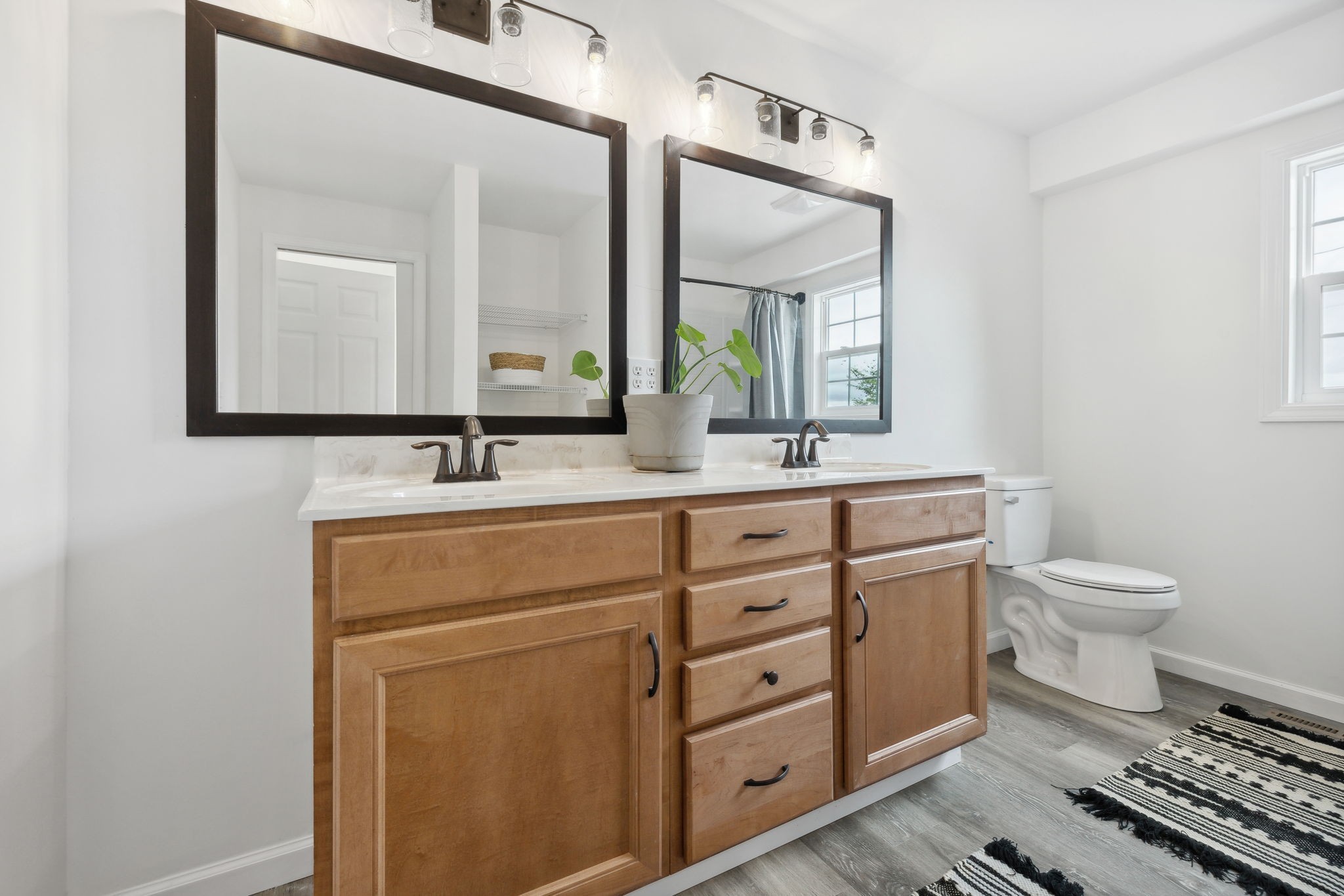 261 Tom Johnson Road Morrison, TN 37357 - Photo 29 of 40 a bathroom with a toilet sink and mirror