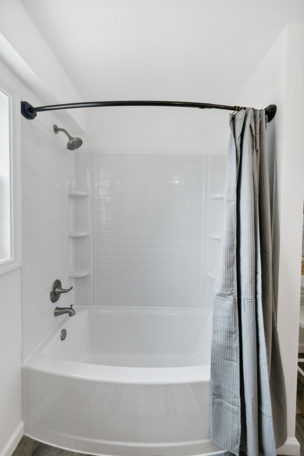 261 Tom Johnson Road Morrison, TN 37357 - Photo 30 of 40 a bathroom with a shower and a bath tub