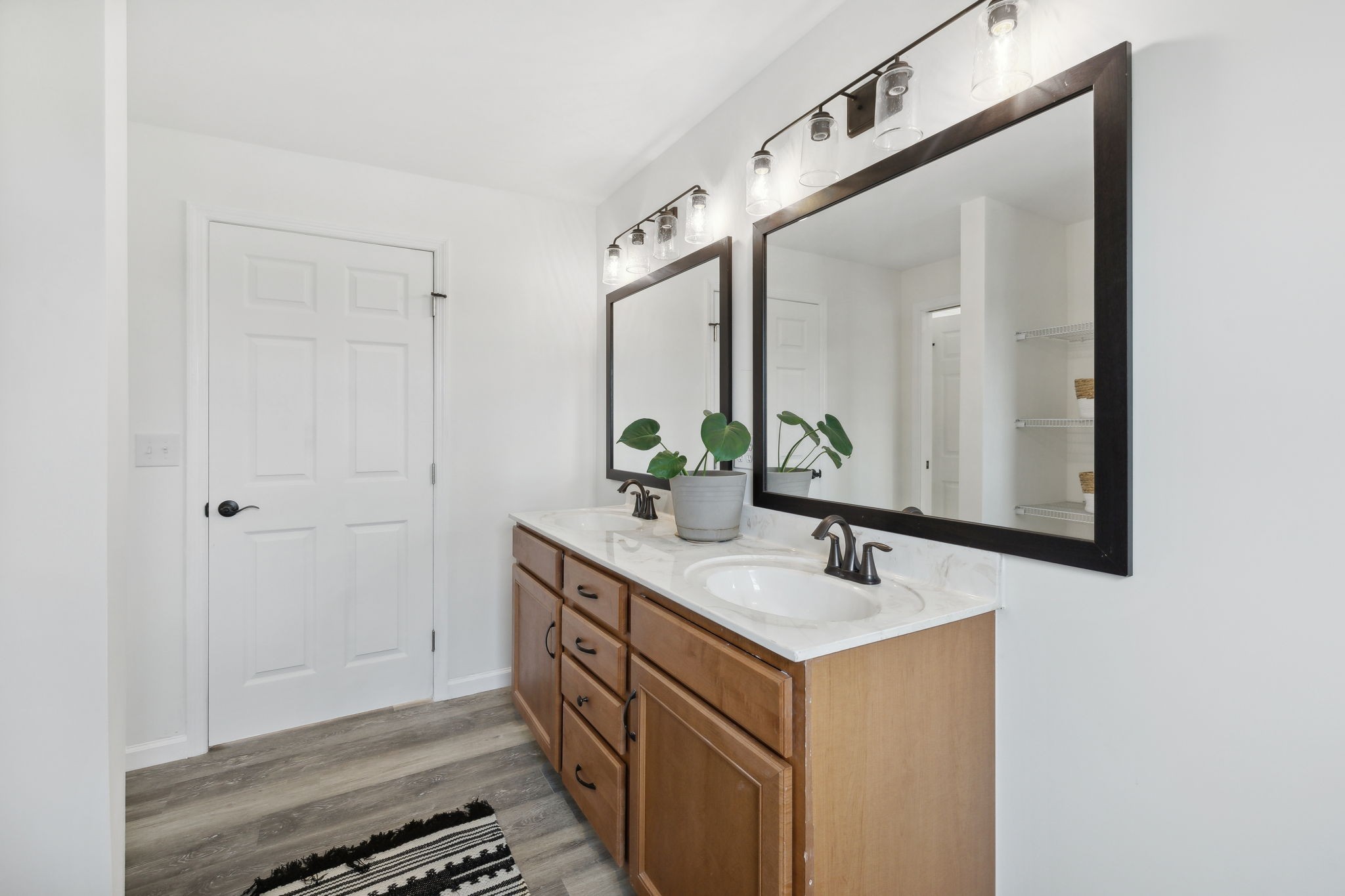 261 Tom Johnson Road Morrison, TN 37357 - Photo 32 of 40 a bathroom with a sink and a mirror