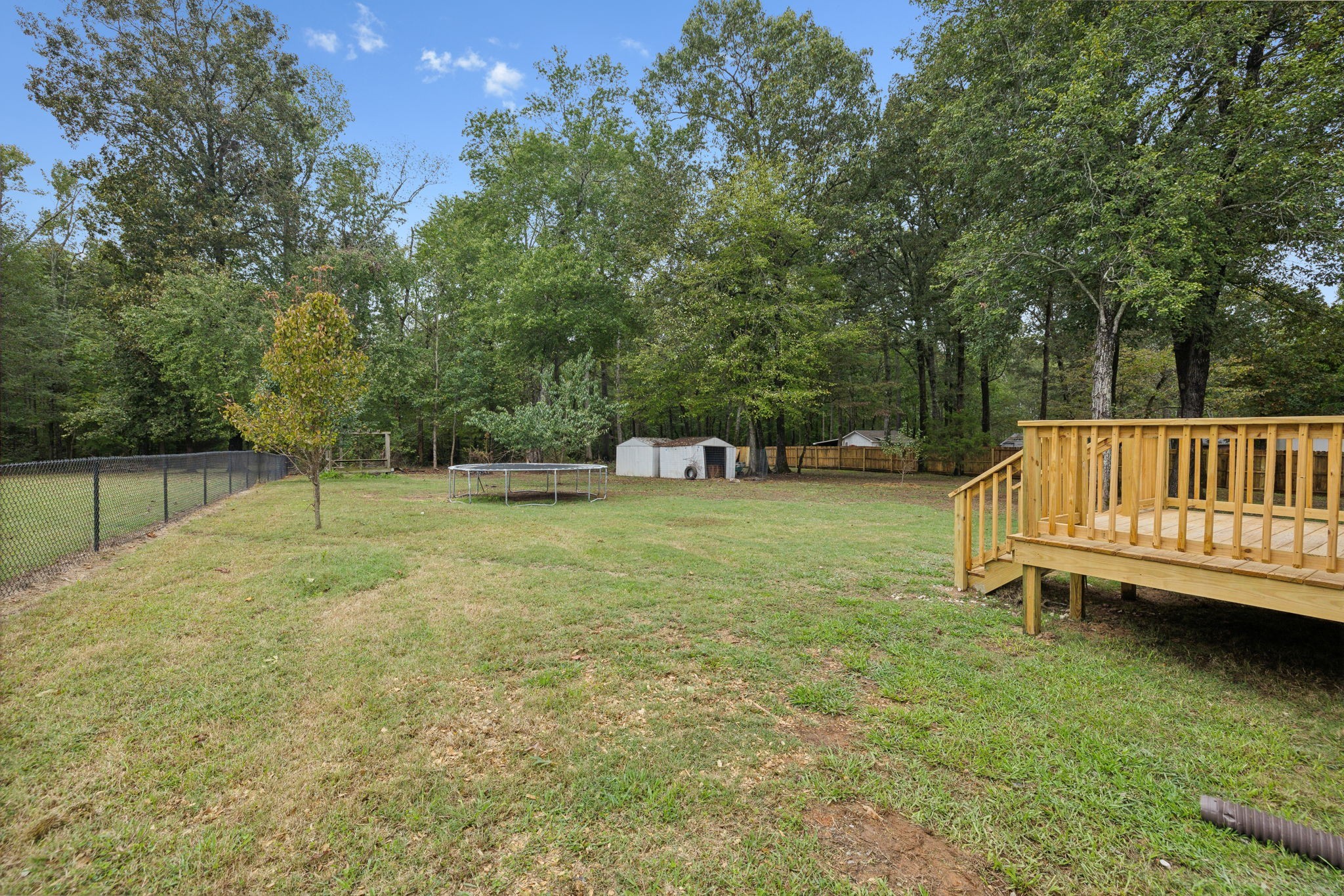 261 Tom Johnson Road Morrison, TN 37357 - Photo 37 of 40 a view of a yard with a house and a bench