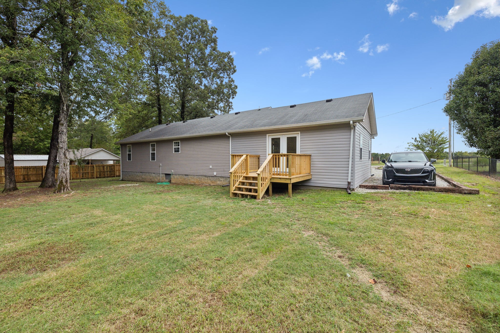 261 Tom Johnson Road Morrison, TN 37357 - Photo 38 of 40 a view of a house with backyard