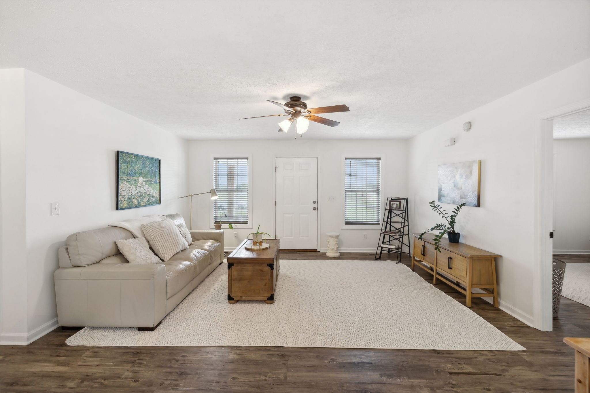 261 Tom Johnson Road Morrison, TN 37357 - Photo 5 of 40 a living room with furniture and a chandelier