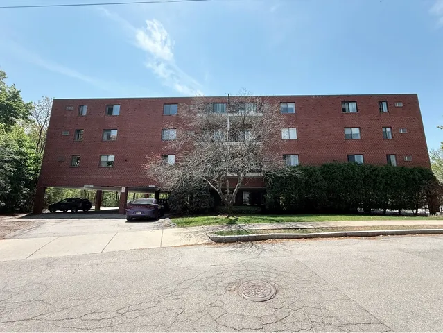 a view of a building with a street