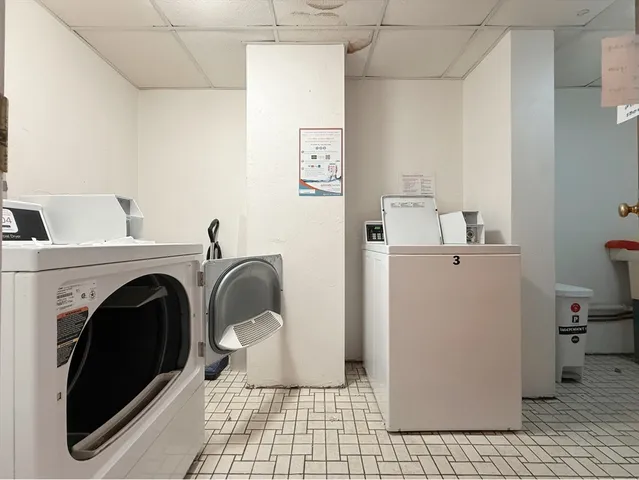 a view of a building with sitting area