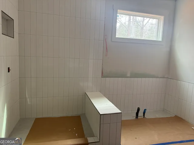 a bathroom with a sink and vanity
