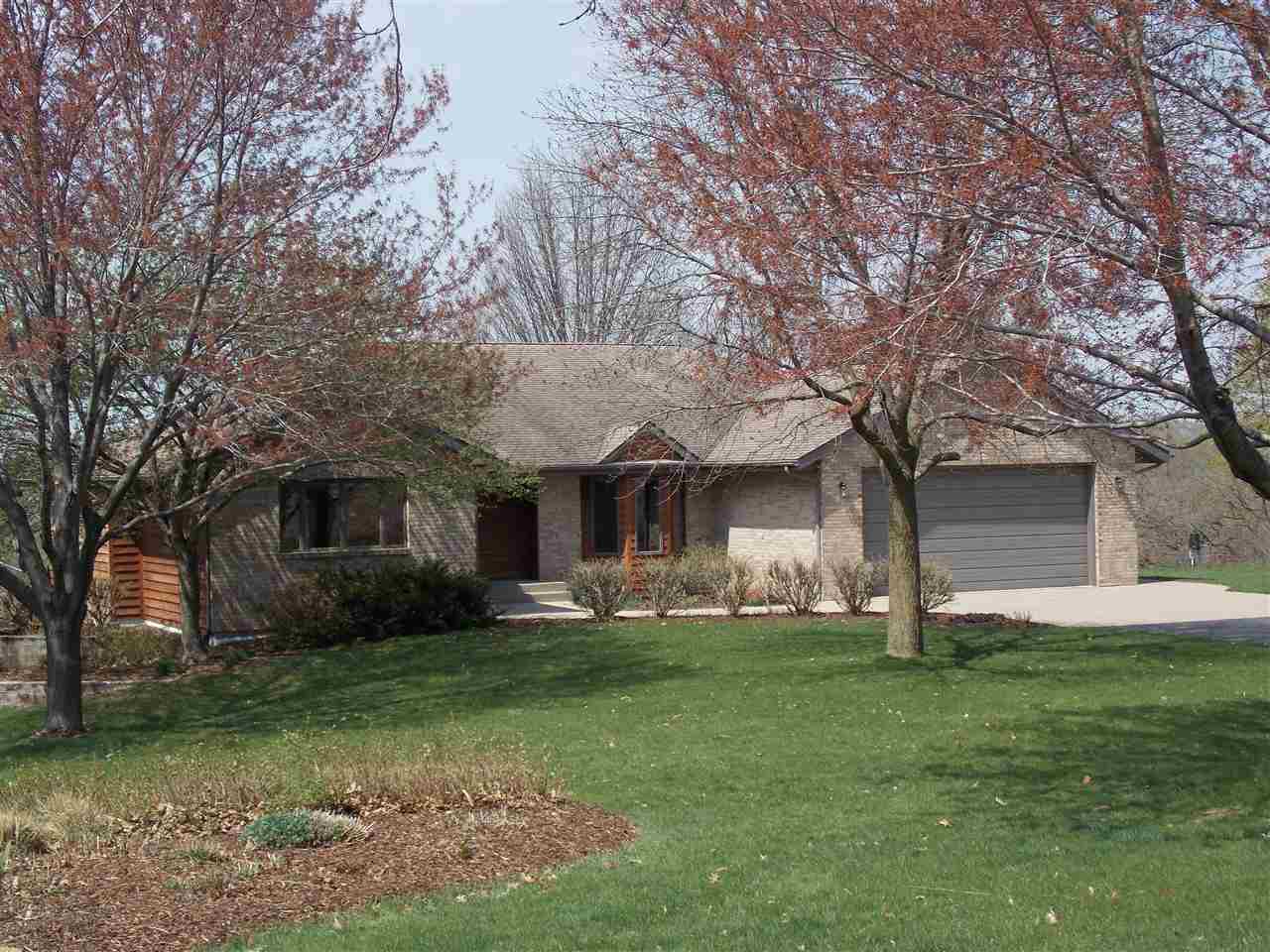 15228 East McNeal Road Monroe Center, IL 61052 - Photo 1 of 25 a front view of house with yard and trees