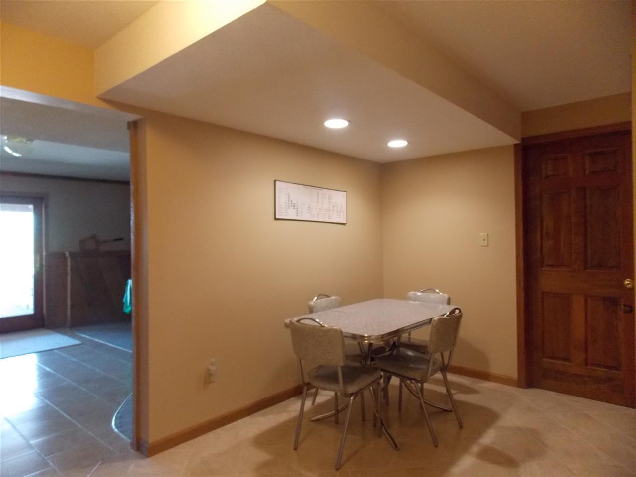 15228 East McNeal Road Monroe Center, IL 61052 - Photo 18 of 25 a view of a dining room with furniture