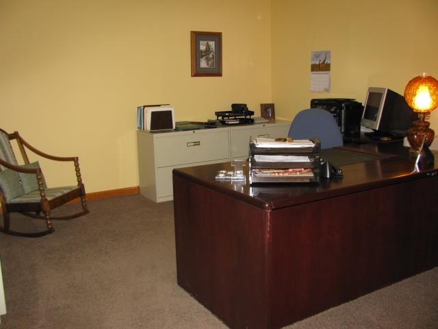 15228 East McNeal Road Monroe Center, IL 61052 - Photo 19 of 25 a view of workspace with a couch