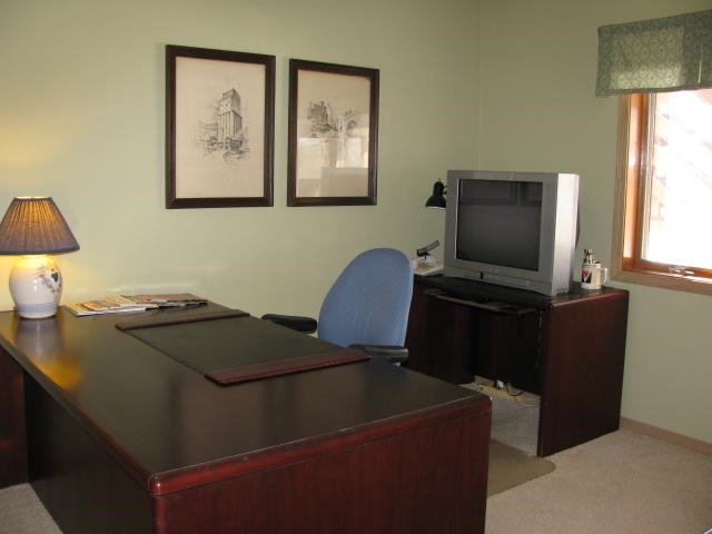 15228 East McNeal Road Monroe Center, IL 61052 - Photo 20 of 25 a bedroom with a bed and furniture