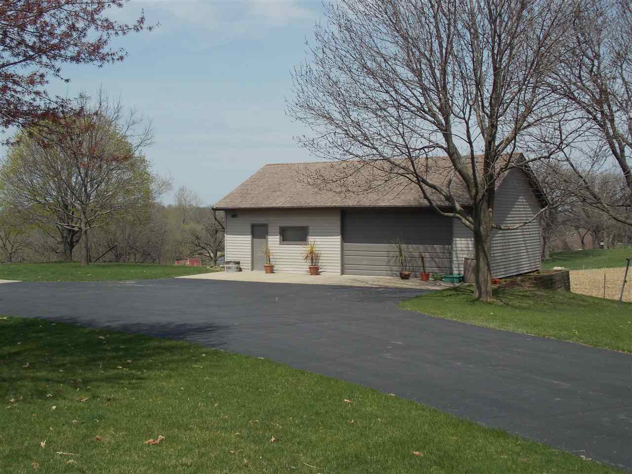 15228 East McNeal Road Monroe Center, IL 61052 - Photo 23 of 25 a front view of a house with a yard